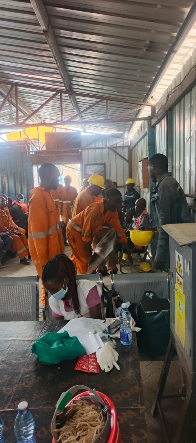 Workers participating in a workplace session
